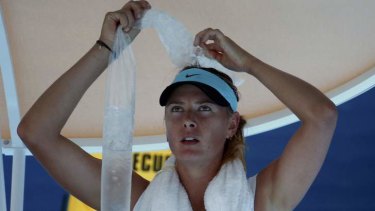 Maria Sharapova attempts to cool down during her marathon second-round match against Karin Knapp.