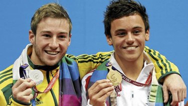 Reaping the rewards … Mitcham with British diver Tom Daley at the 2010 Delhi Commonwealth Games.