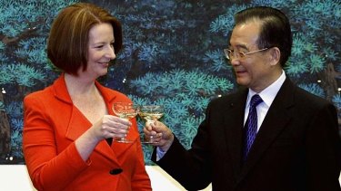Chinese Premier Wen Jiabao toasts Australian Prime Minister Julia Gillard during her visit in April 2011.