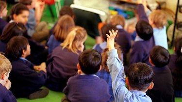 Early starters ... parents in Sydney's south-west are more likley to send their children to school at a younger age compared to parents in more addluent northern suburbs.