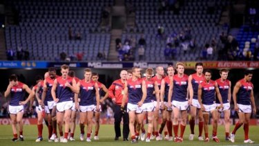 One of the boys: the late Dean Bailey with his players at Etihad Stadium.