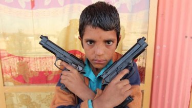 Steel, the young (perhaps 10-year-old) leader of a street gang in Jalalabad, Afghanistan, in George Gittoes' documentary <i>Snow Monkey</i>.