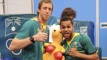 Patrick Mills, right, hamming it up with Joe Ingles in London. But it hasn't all been fun and games for the Indigenous basketball star.