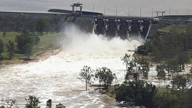 Millions of litres of water are released from Wivenhoe Dam.
