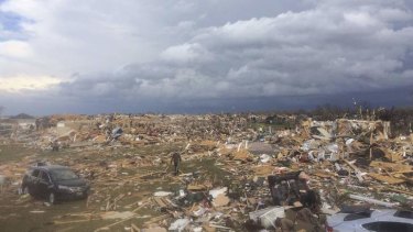 Extensive damage is pictured in the aftermath of a tornado that touched down in Washington, Illinois in this photo courtesy of Anthony Khoury.