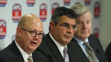 Deal-makers ... Foxtel's Kim Williams, the AFL's Andrew Demetriou and Seven Network's David Leckie at yesterday's announcement.