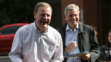 BFFs to biffo ... Peter Costello and Michael Kroger visit polling booths together at the  2007 election.
