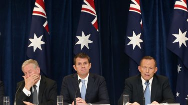 WA Premier Colin Barnett, NSW Premier Mike Baird and Prime Minister Tony Abbott after the COAG meeting at Victoria Barracks in Sydney. 
