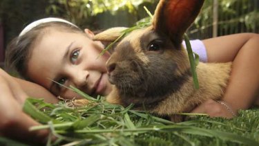 Kyra Wallace with her pet rabbit, Thumper.