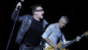 Bono and Adam Clayton perform in Moscow.