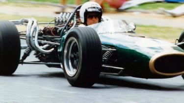 Sir Jack Brabham exits a corner in a Repco Brabham 1966 at Albert Park in 1994.
