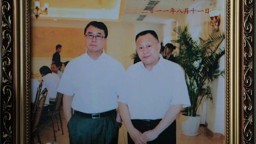 Police chief Wang Lijun and lawyer Zhou Litai photographed  in the police cafeteria.