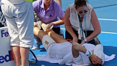 Medical treatment ... Galina Voskoboeva of Kazakhstan is affected by the high temperatures at the Sydney International.