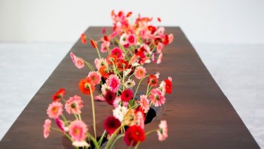 Lee Mingwei's <i>The Moving Garden</i>, 2009/2014 mixed media interactive installation granite, fresh flowers