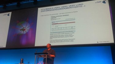 Scott McIntyre on stage at the AusCERT 2012 conference. On the screen is how Fairfax reported the Telstra privacy breach in December.