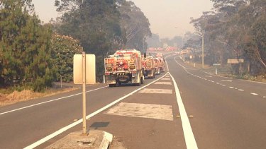 Fire trucks head towards Lithgow on Monday morning.