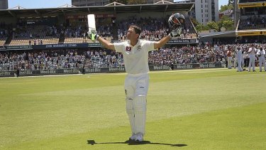 Ricky Ponting waves to the crowd as he makes his way back to the pavilion after his last international innings.
