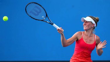 Olivia Rogowska plays a forehand in her first-round match against Mariana Duque-Marino of Colombia.