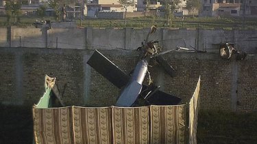The US helicopter that crashed at bin Laden's compound. No Americans were injured.