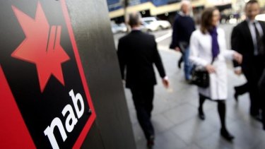 NAB projects a 14 per cent fall in full-year cash profit in the range of $5.1 billion to $5.2 billion, compared with year-earlier profit of $5.94 billion, and a Bloomberg consensus estimate of $6.18 billion.