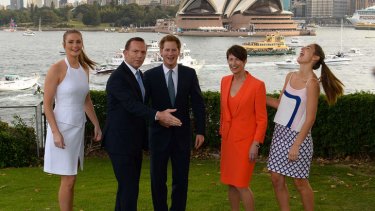 Prime Minister Tony Abbott with Prince Harry, his wife Margie and daughters Bridget, left, and Francis, right at Kirribilli House.