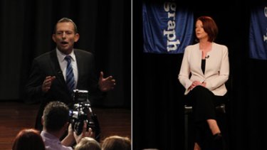 Talking the talk ... Tony Abbott and Julia Gillard at Rooty Hill RSL club last night.