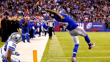 Greatest grab ever: Odell Beckham of the New York Giants scores a touchdown against the Cowboys 