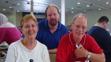 Geraldine, John and Michael Sharwood fled their Auchenflower home to take shelter at the RNA Showgrounds emergency centre at dawn this morning.