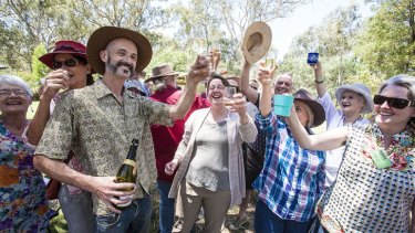 Locals and renewable energy supporters celebrate   the approval of the Cherry Tree wind farm near Seymour earlier this month.