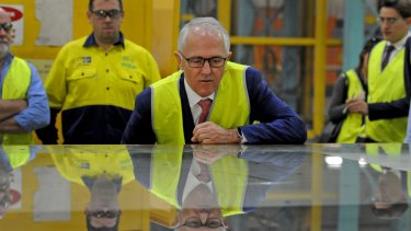 Prime Minister Malcolm Turnbull inspects sheet glass at CSR Viridian.