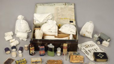 A World War II medical kit, including a bottle of acriflavine near the front left corner of the case.
