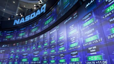 Trading activity is displayed on electronic boards at the Nasdaq MarketSite in New York in March. Its systems were hacked in February.