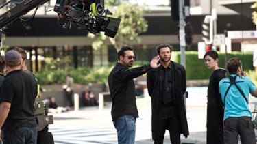 James Mangold directs Hugh Jackman on the set of <i>The Wolverine</i>.