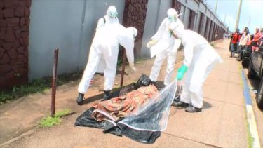 Workers pack up the man's body, only to find out he is alive. <i>Source: ABC News</i>
