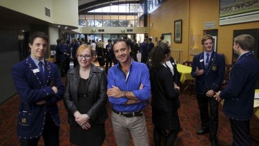 Change agent: Waverley College school captain Oscar Osborne with former Domestic Violence NSW CEO Tracy Howe and entertainer Andrew O'Keefe at the forum.