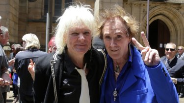 Colin Burgess, an ex-AC/DC drummer, with his brother Dennis Burgess, of the Masters Apprentices, at Stevie Wright's funeral. 