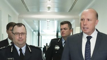 AFP deputy commissioner Karl Kent (left) with Home Affairs Minister Peter Dutton in Canberra on Tuesday.
