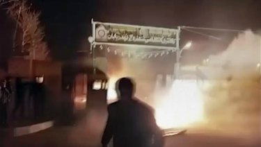An attack on Iran police station in Qahdarijan, Iran. 