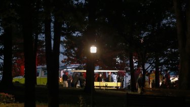 Emergency workers at the scene of a capsized tourist boat in Missouri.