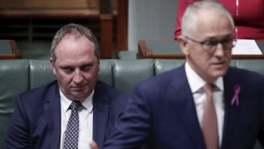 Deputy Prime Minister Barnaby Joyce listens to Prime Minister Malcolm Turnbull in question time.