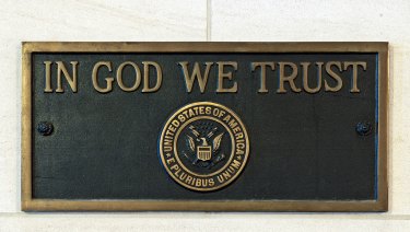 The US motto on a plaque at the US Capitol building. Louisiana will require public schools to display the motto by August 2019. Florida passed the same bill in February.