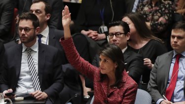 United States Ambassador to the United Nations Nikki Haley votes against a draft resolution presented by Russia during a Security Council meeting.