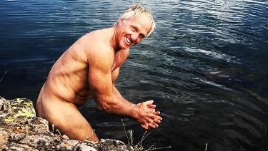 Greg Norman taking a bath after a two-day horse ride, 11,850-feet above sea level in the Colorado Flat Top Wilderness.