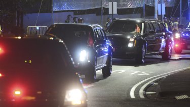 Donald Trump's motorcade arrives at the Shangri-la Hotel in Singapore on Sunday.