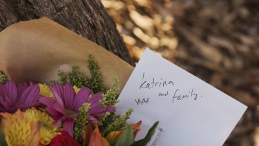 Flowers left outside the Osmington property where the bodies of seven people were found. 