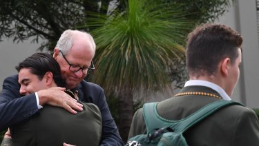 grammar trinity davies haircut resigns headmaster wake saga michael rohan greets principal deputy students brown his return