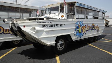 A duck boat sits idle in the parking lot of Ride the Ducks. It is similar to one of the company's boats that capsized.