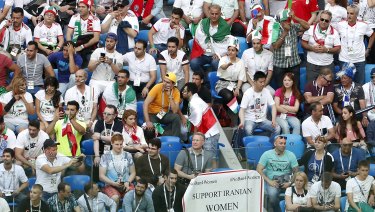 A poster to support Iranian women is displayed in the stands during the group B match between Morocco and Iran at the 2018 soccer World Cup in the St. Petersburg.