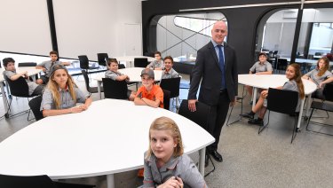 Principal Colin Simpson and students inside the new Richmond High