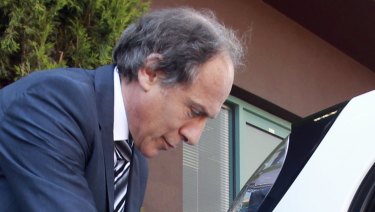 In praise of the transport revolution: Chief Scientist Alan Finkel with an electric car.
